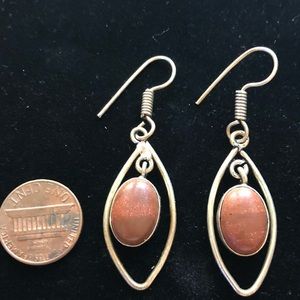 Real silver and sparkling rust colored goldstone